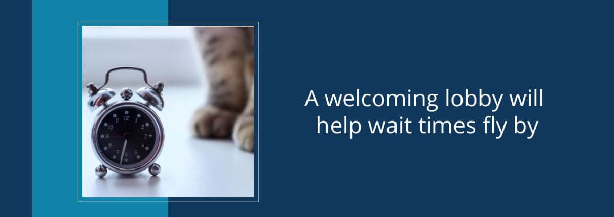 Photo of a kitten next to a clock