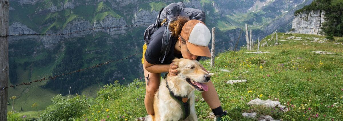Take time to explore, woman with dog hiking